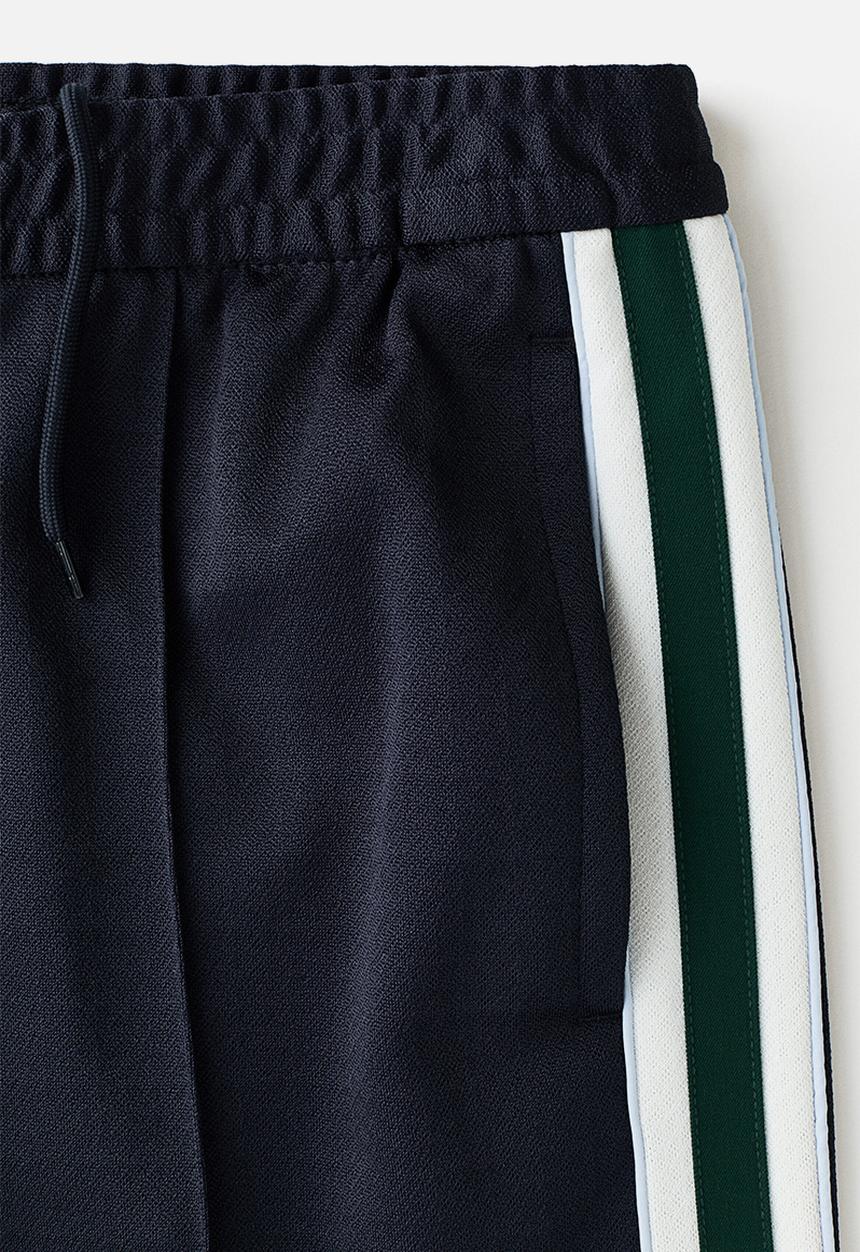 H&M - Relaxed fit track pants - navy blue/stripes