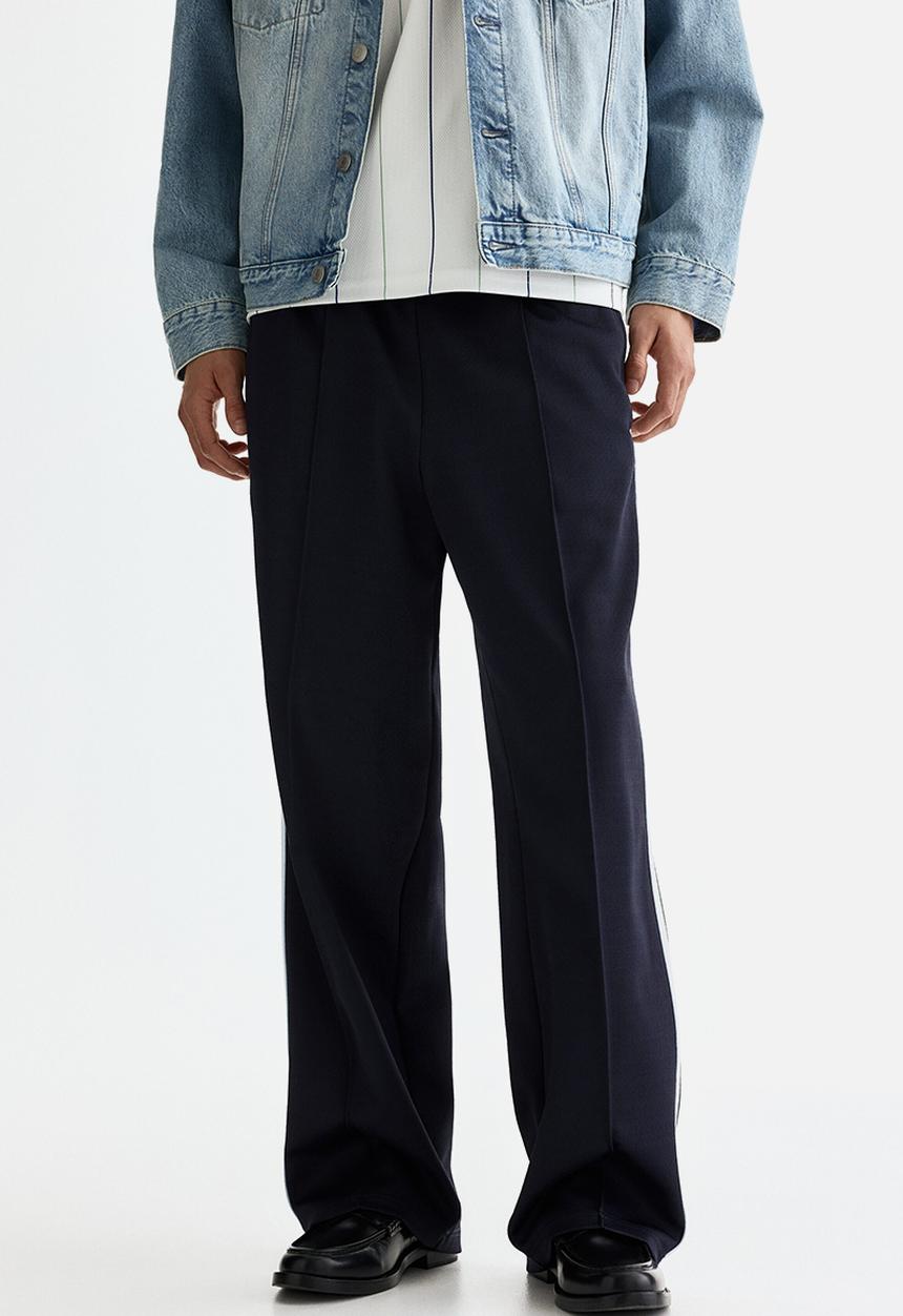 H&M - Relaxed fit track pants - navy blue/stripes