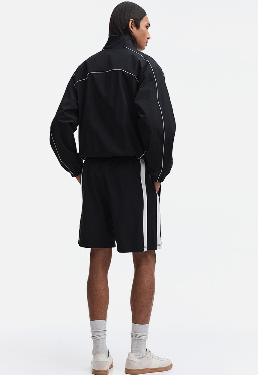 H&M - Regular fit track shorts - black/colour block