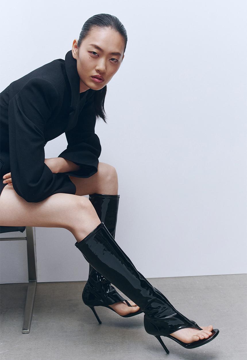 H&M - WARDROBE.NYC H&M:  Cut-out leather sock boots - black