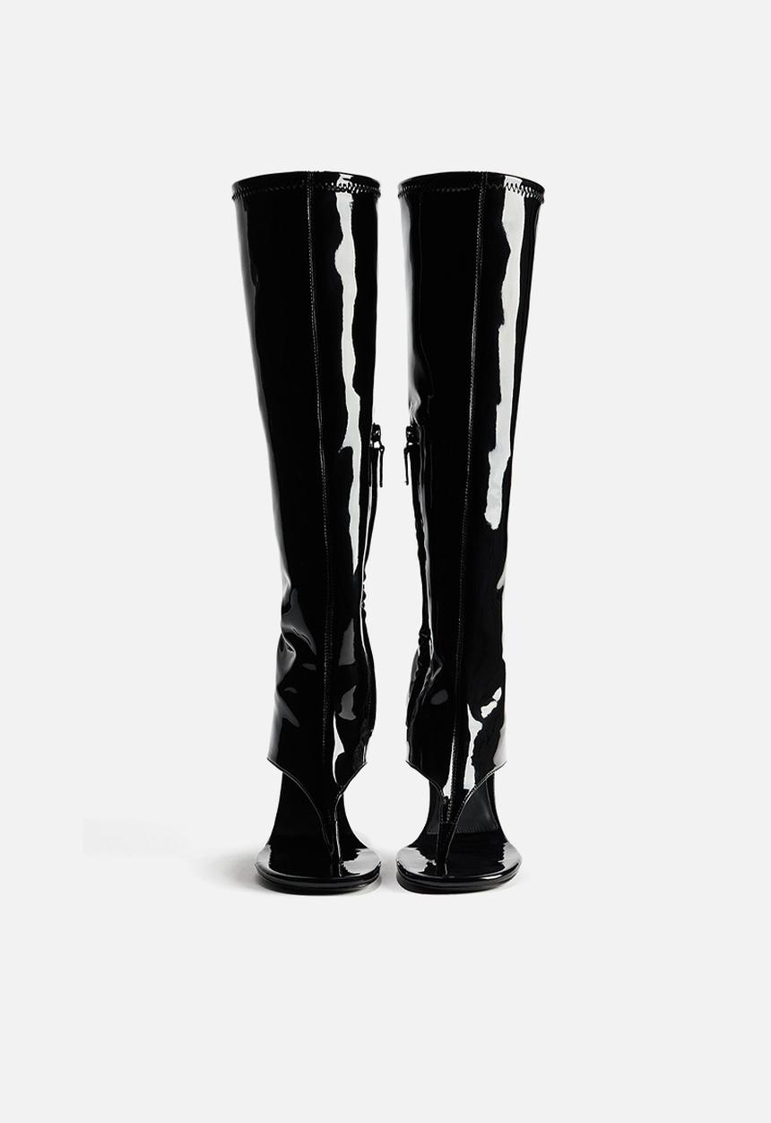 H&M - WARDROBE.NYC H&M:  Cut-out leather sock boots - black