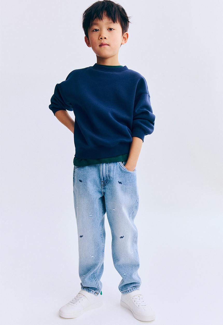 H&M - Loose fit jeans - light denim blue/dinosaurs