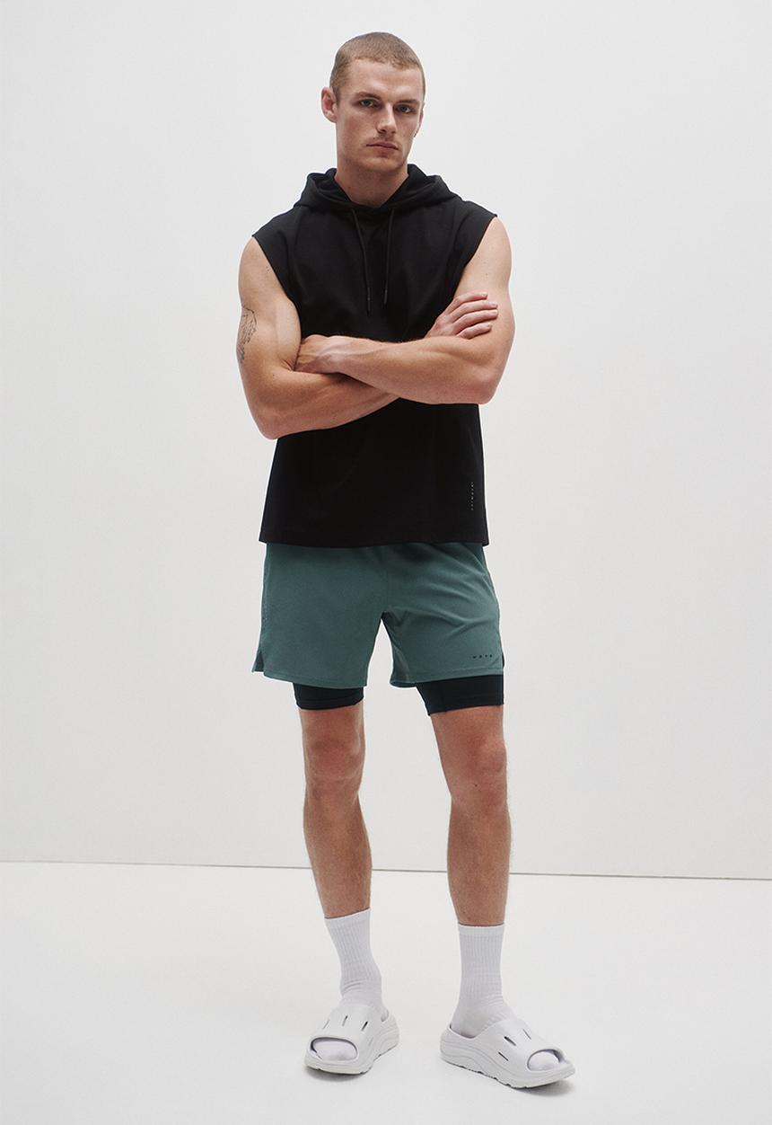 H&M - Double-layered sports shorts with drymove? - dusty green
