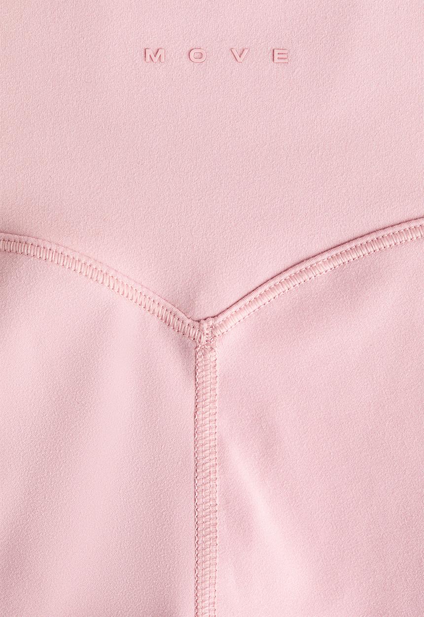 H&M - Flared yoga leggings with softmove. - pastel pink