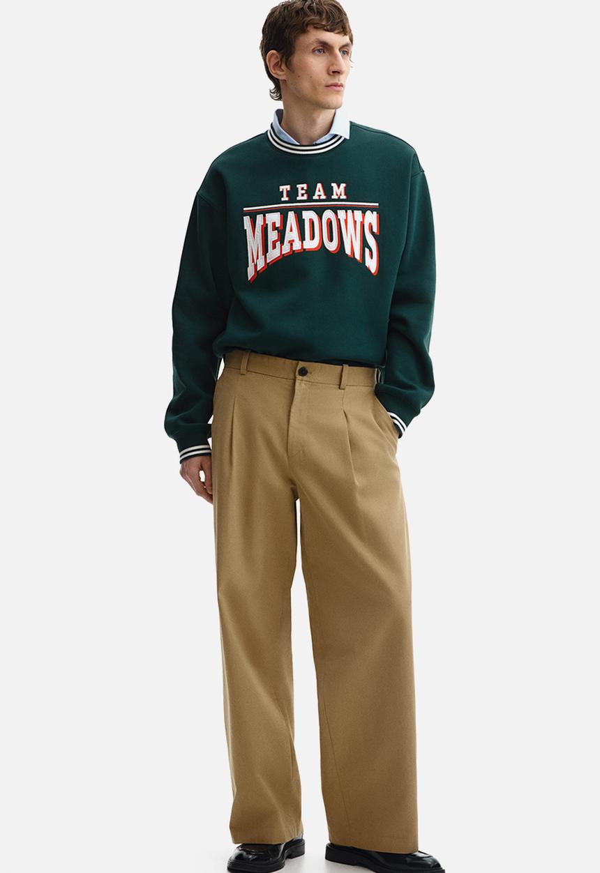H&M - Loose fit printed sweatshirt - dark green/team meadows