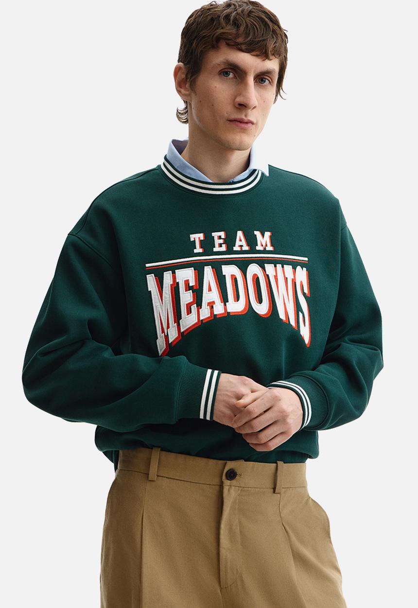 H&M - Loose fit printed sweatshirt - dark green/team meadows