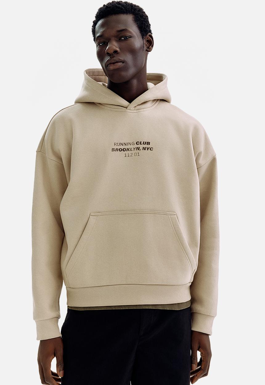 H&M - Loose fit hoodie - beige/running club