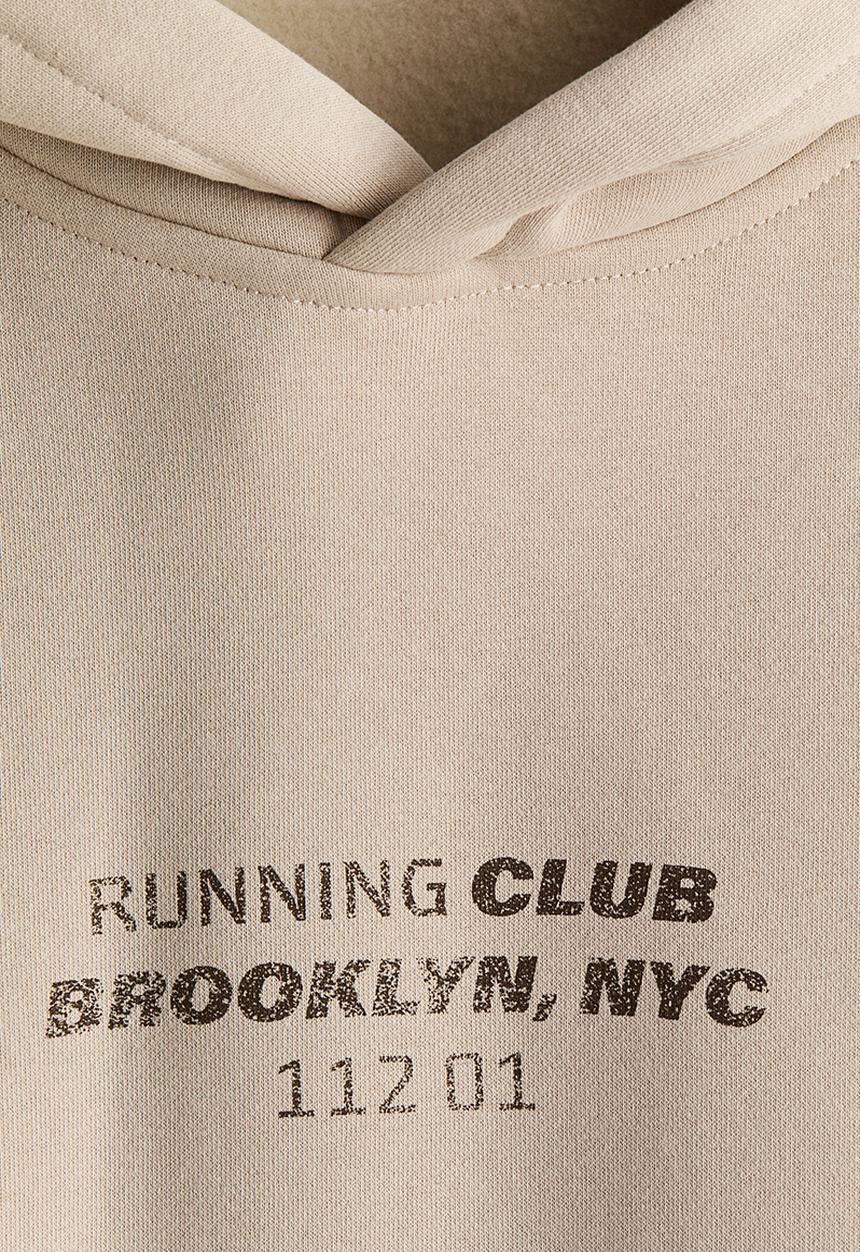 H&M - Loose fit hoodie - beige/running club