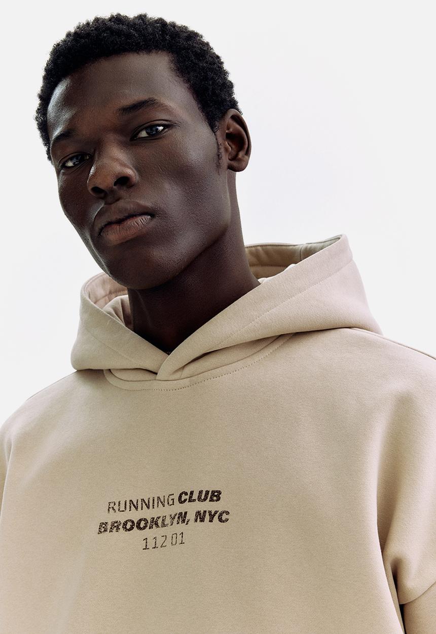 H&M - Loose fit hoodie - beige/running club