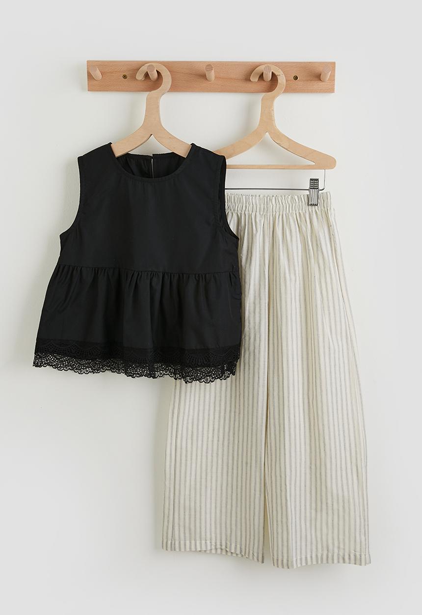 Pop Candy - Lace hem peplum top with striped pants - black/ivory