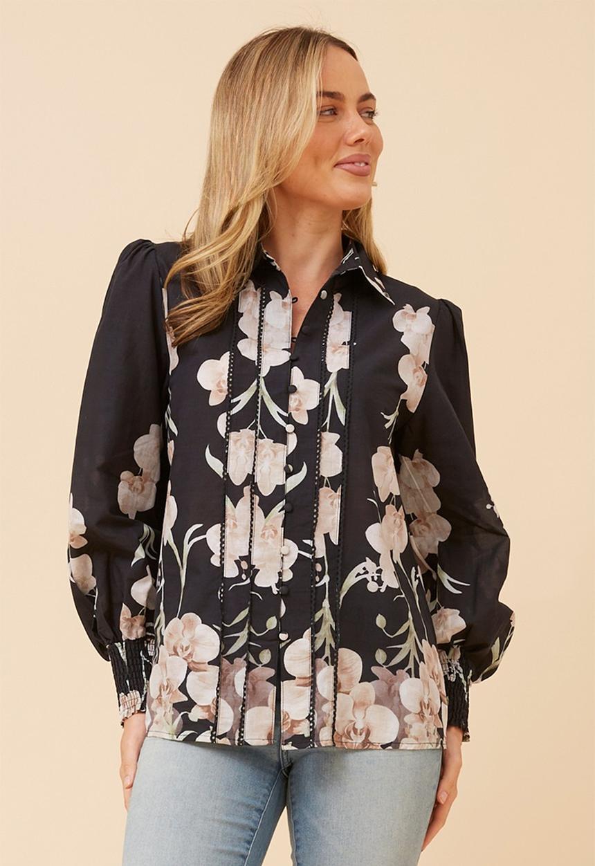 Izabel London - L/S With Elastication At Cuff, Covered Button Through Printed Blouse With Lace Trim On Chest - Multi Black