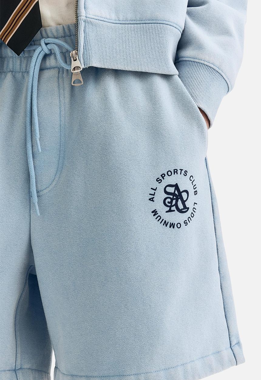 H&M - Relaxed fit shorts - light blue/all sports club