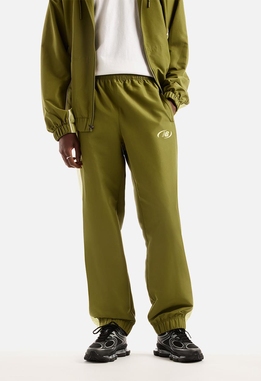 New Balance  - New Balance Trackside Woven Pant - green