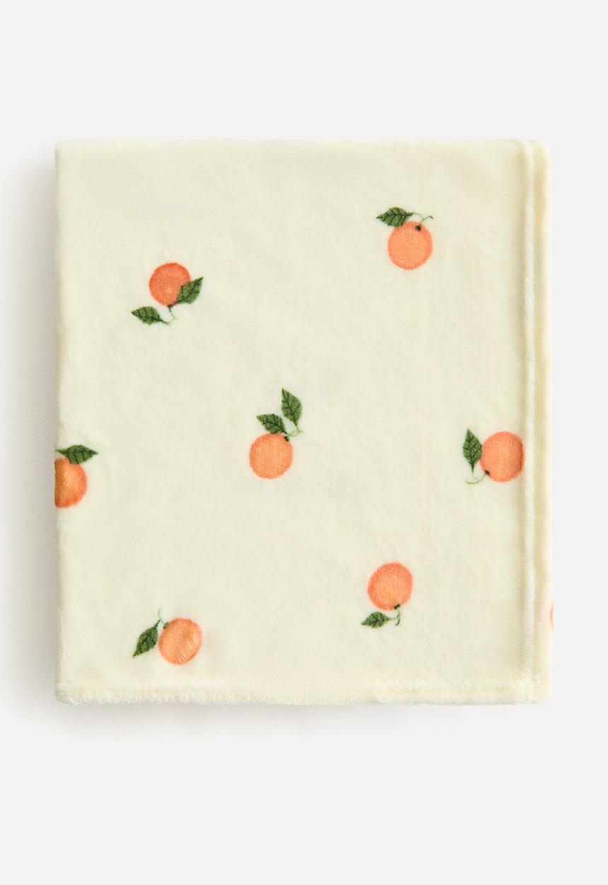 H&M - Patterned fleece blanket - light yellow/oranges