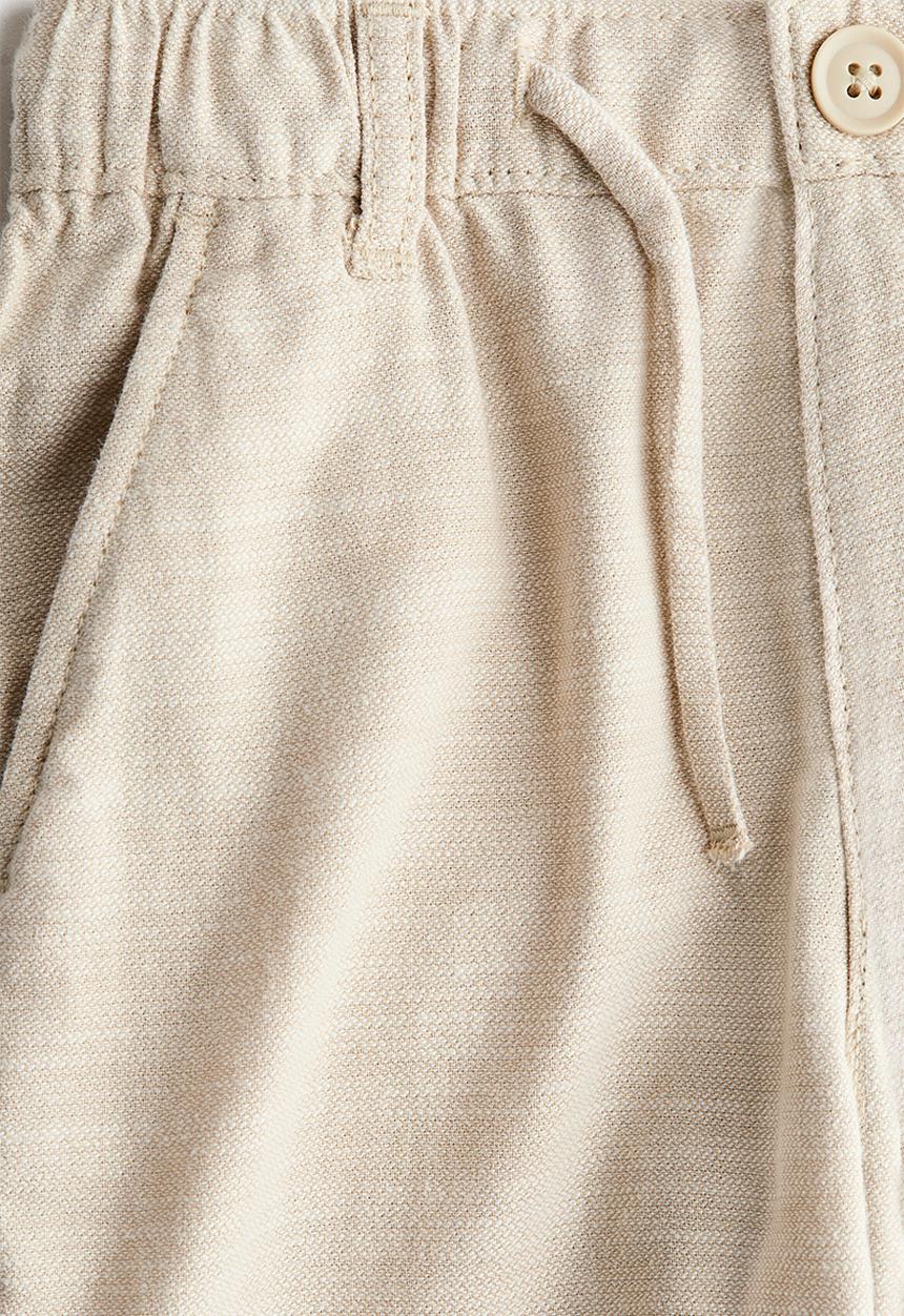 H&M - Cotton roll-up trousers - light beige