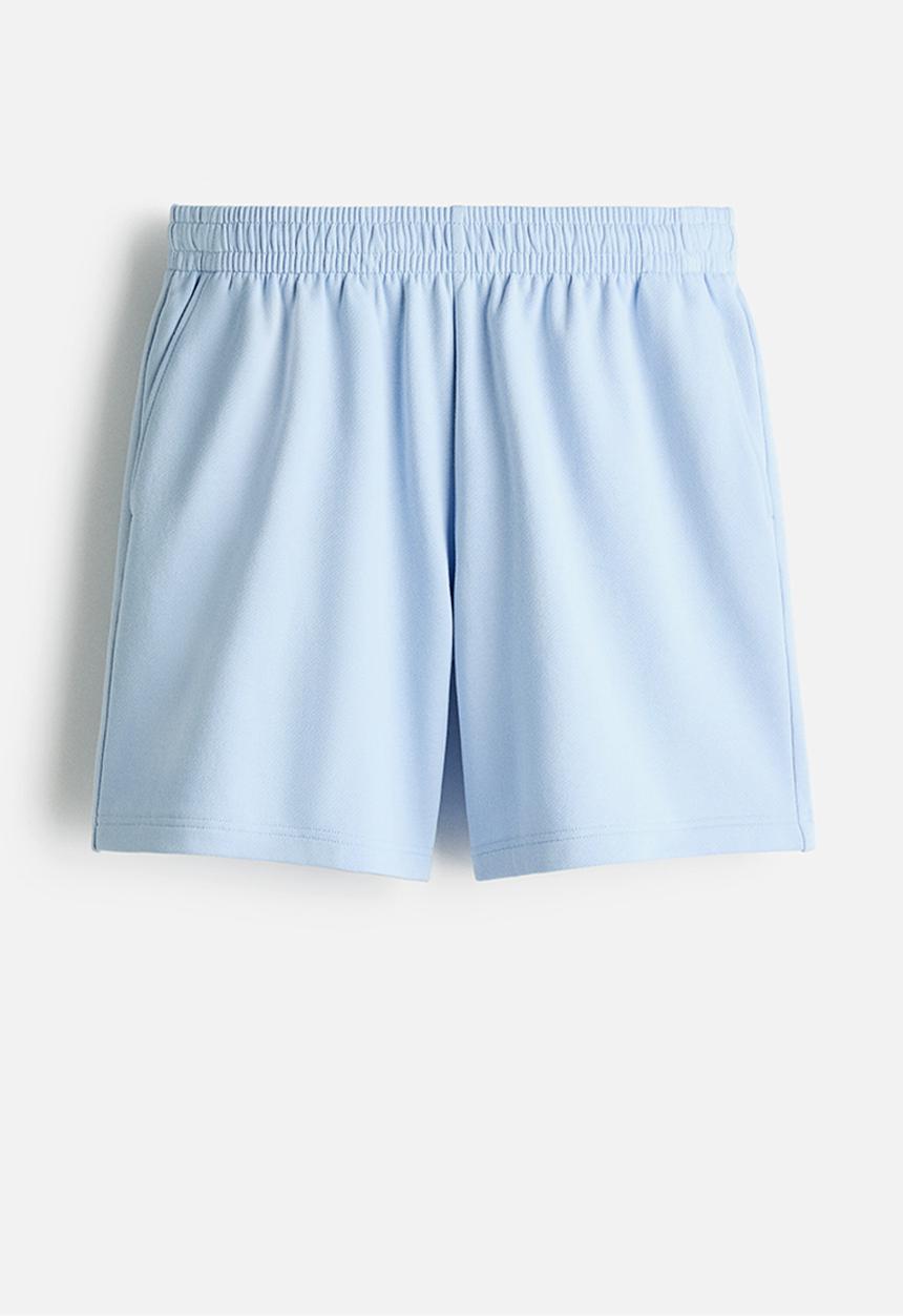H&M - Regular fit sweatshorts - light blue
