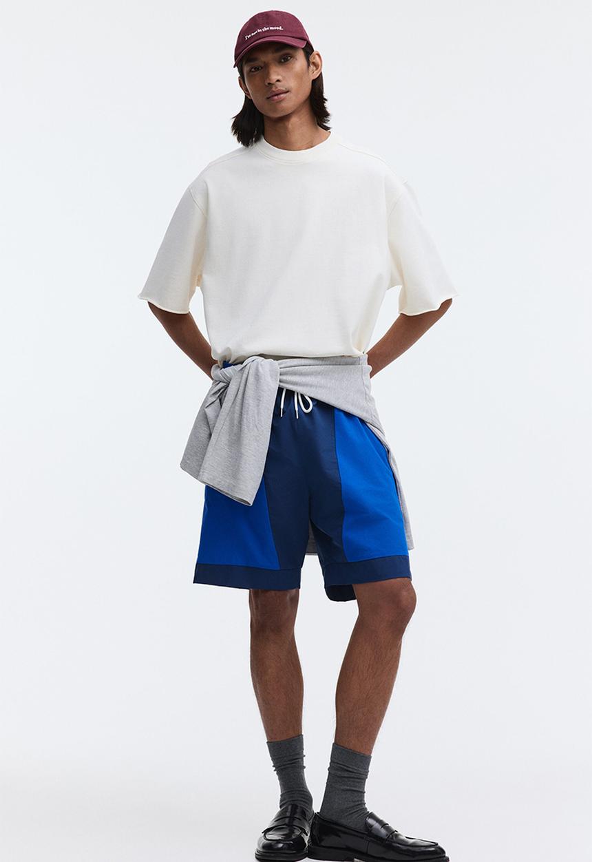 H&M - Loose fit track shorts - dark blue/colour block