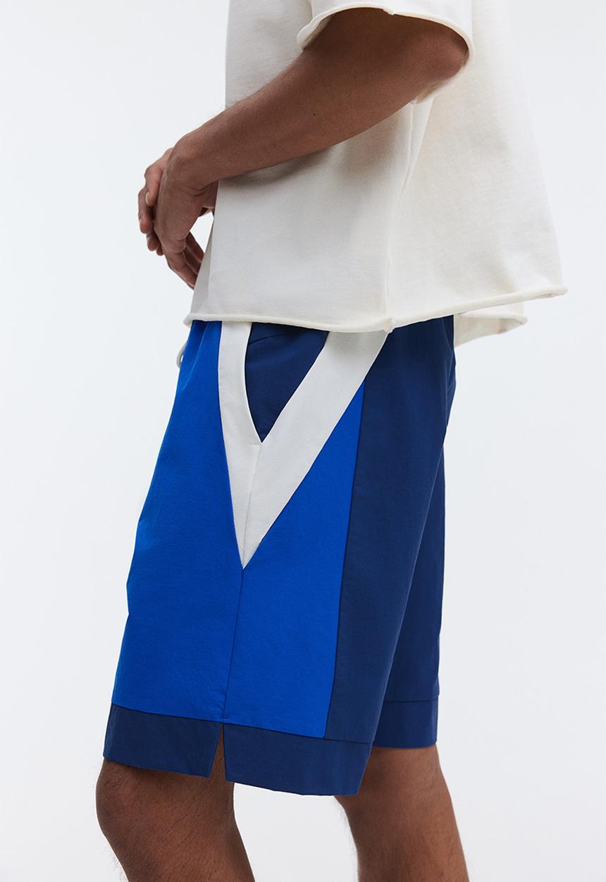 H&M - Loose fit track shorts - dark blue/colour block