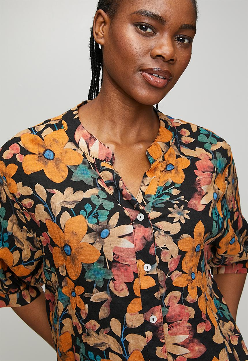 Izabel London - Half Sleeve Batwing Easy Wearing Printed Sheer Blouse With Back Button Stand Detail - Black Multi