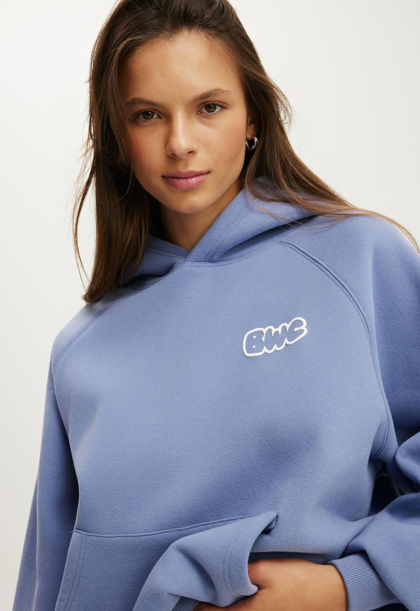Cotton On - Plush Premium Graphic Raglan Hoodie - Blue Ice/Body Wellness