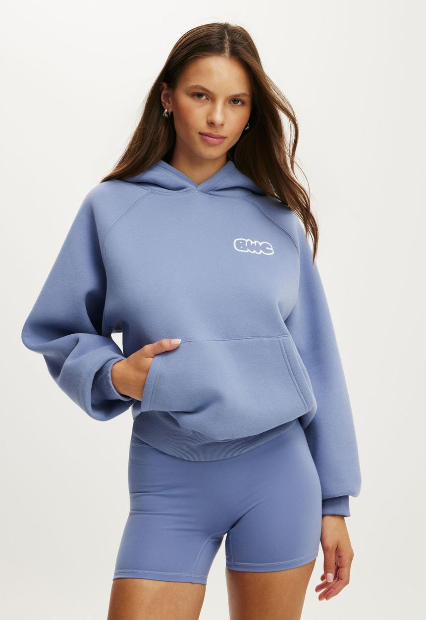 Cotton On - Plush Premium Graphic Raglan Hoodie - Blue Ice/Body Wellness