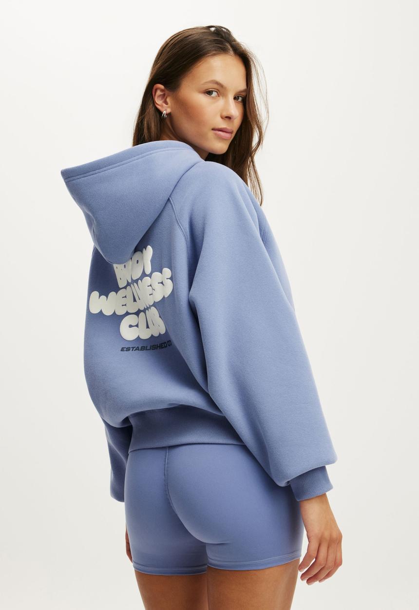 Cotton On - Plush Premium Graphic Raglan Hoodie - Blue Ice/Body Wellness