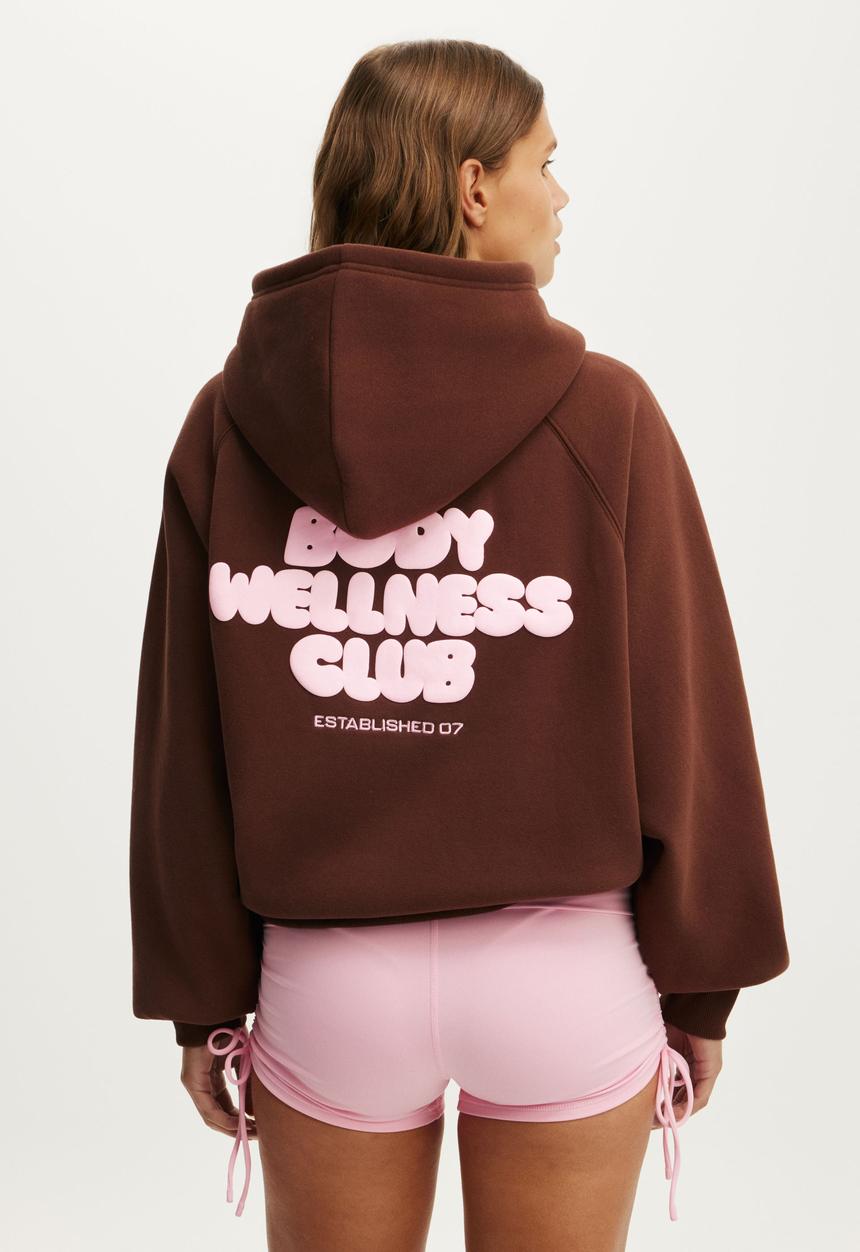 Cotton On - Plush Premium Graphic Raglan Hoodie - Chestnut/Body Wellness
