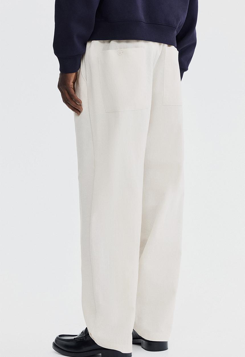 H&M - Regular fit cotton-blend trousers - light beige