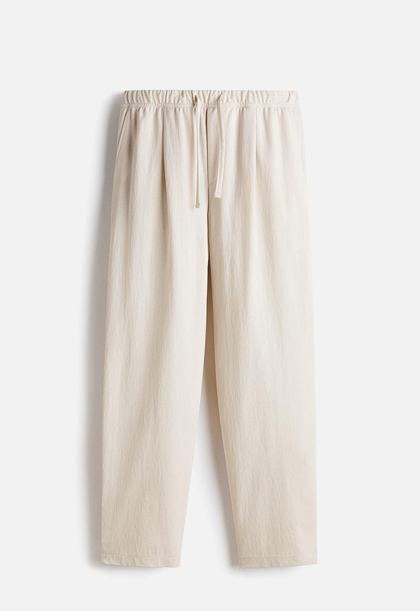 H&M - Regular fit cotton-blend trousers - light beige