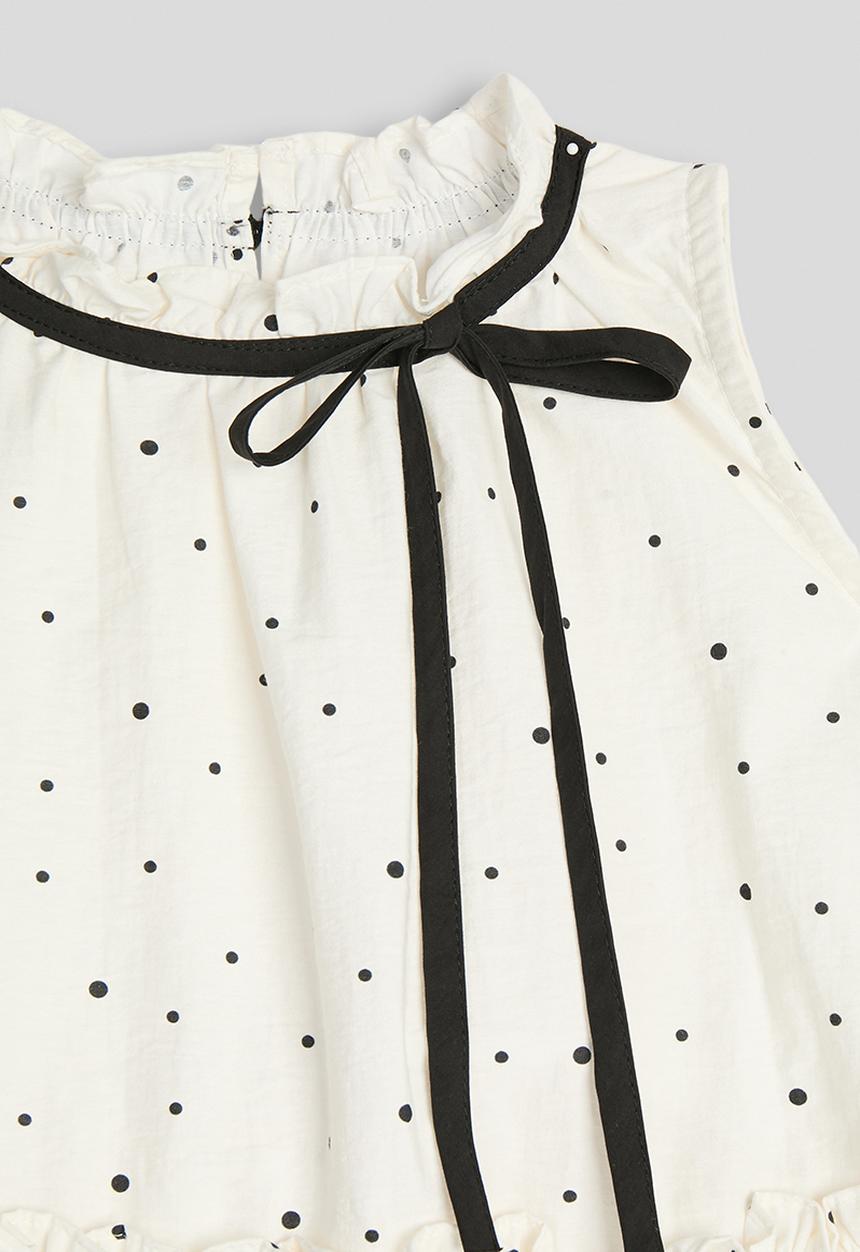 Pop Candy - Dotted pattern dropped hem top - cream