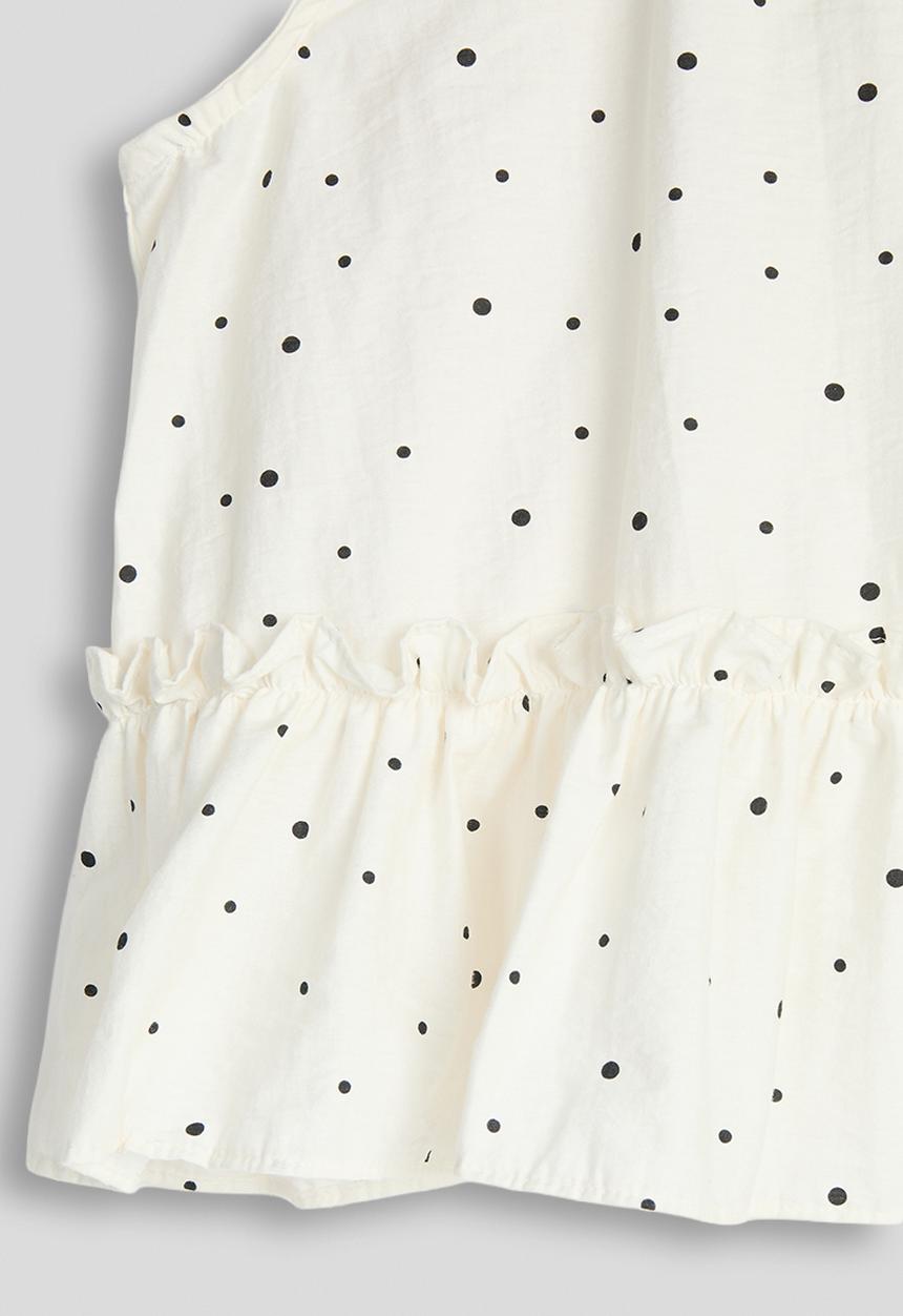 Pop Candy - Dotted pattern dropped hem top - cream