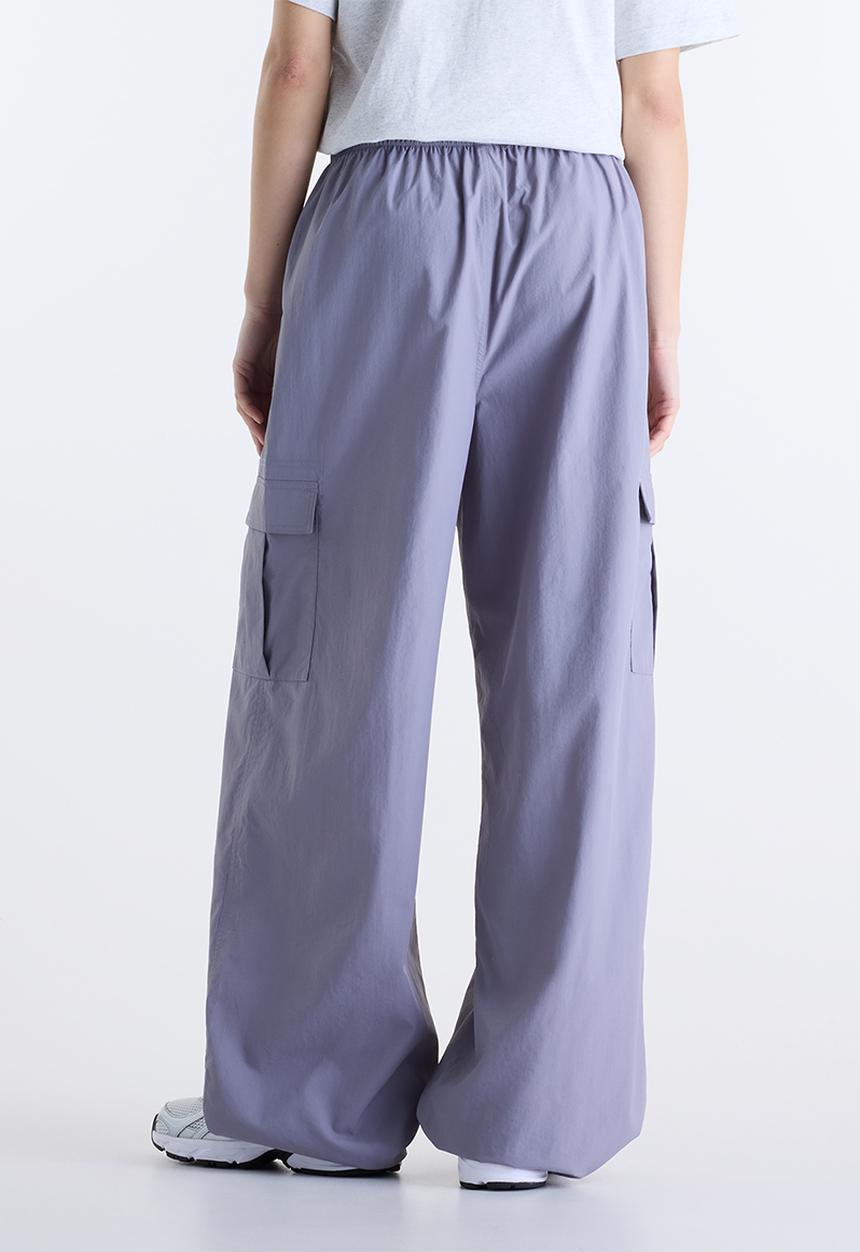 New Balance  - NB Athletics Cargo Pant - Off-Line Grey