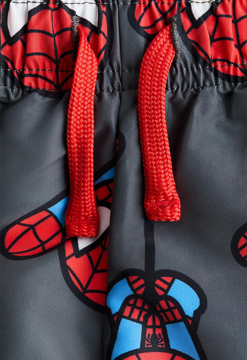 H&M - Printed swim shorts - dark grey/marvel comics