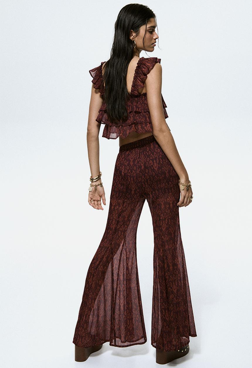 H&M - Flared crinkled trousers - burgundy/patterned