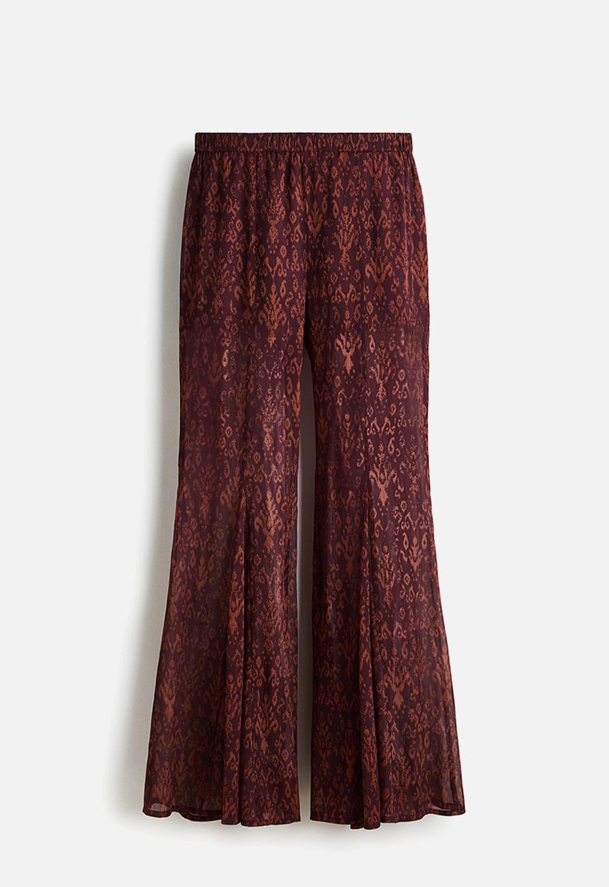 H&M - Flared crinkled trousers - burgundy/patterned