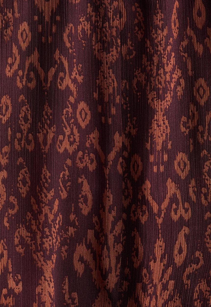 H&M - Flared crinkled trousers - burgundy/patterned