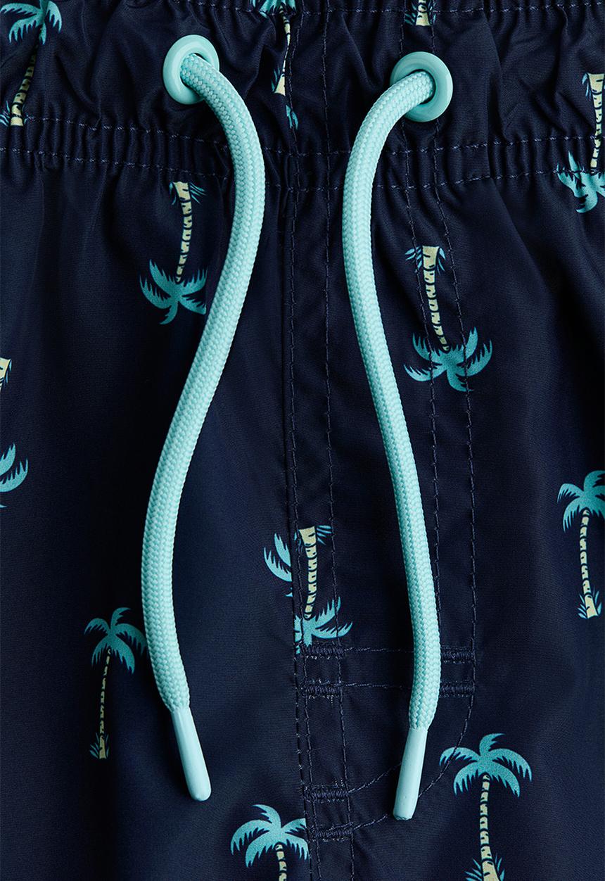 H&M - Printed swim shorts - navy blue/palm trees
