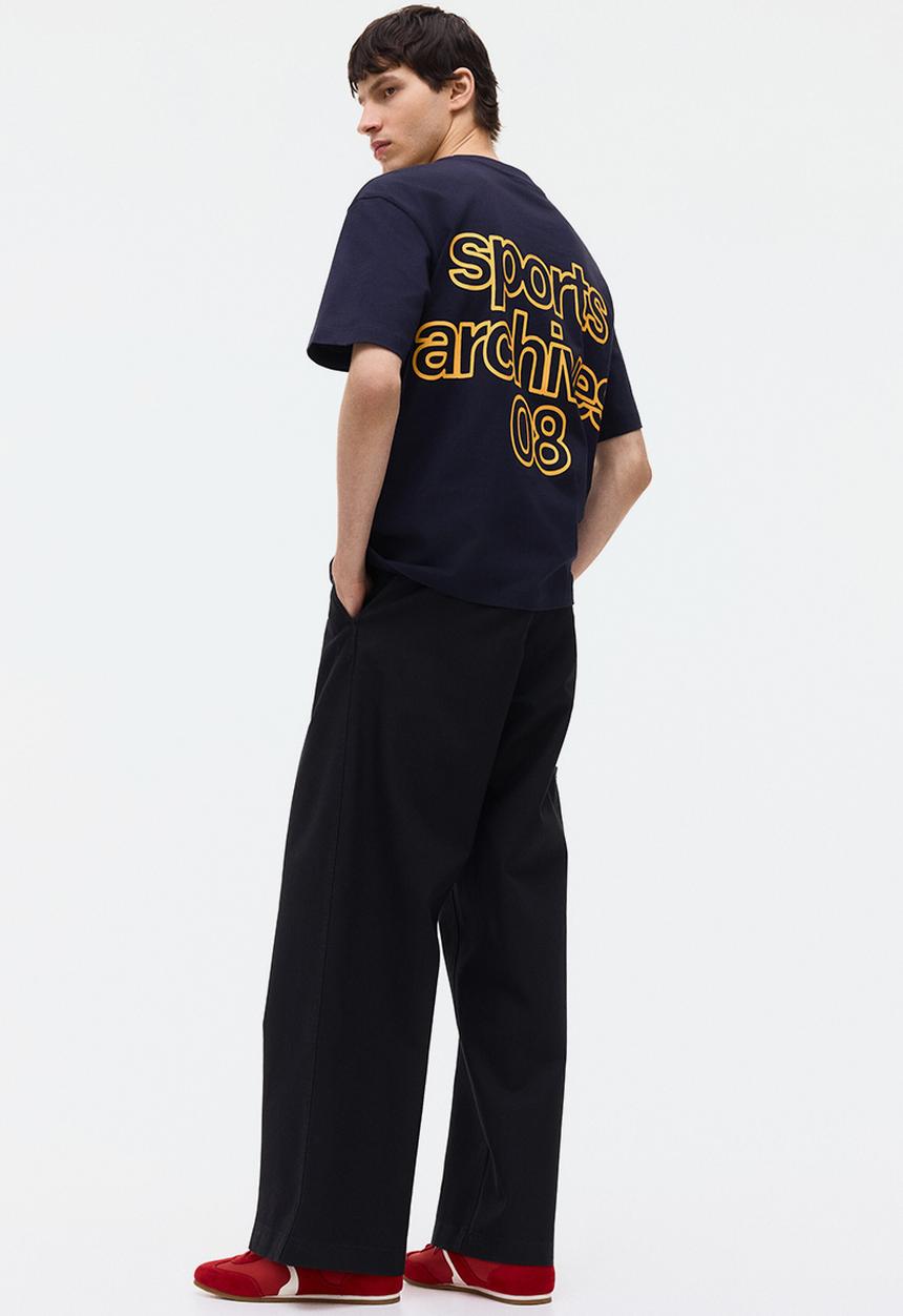 H&M - Loose fit printed t-shirt - dark grey/sports archives 08