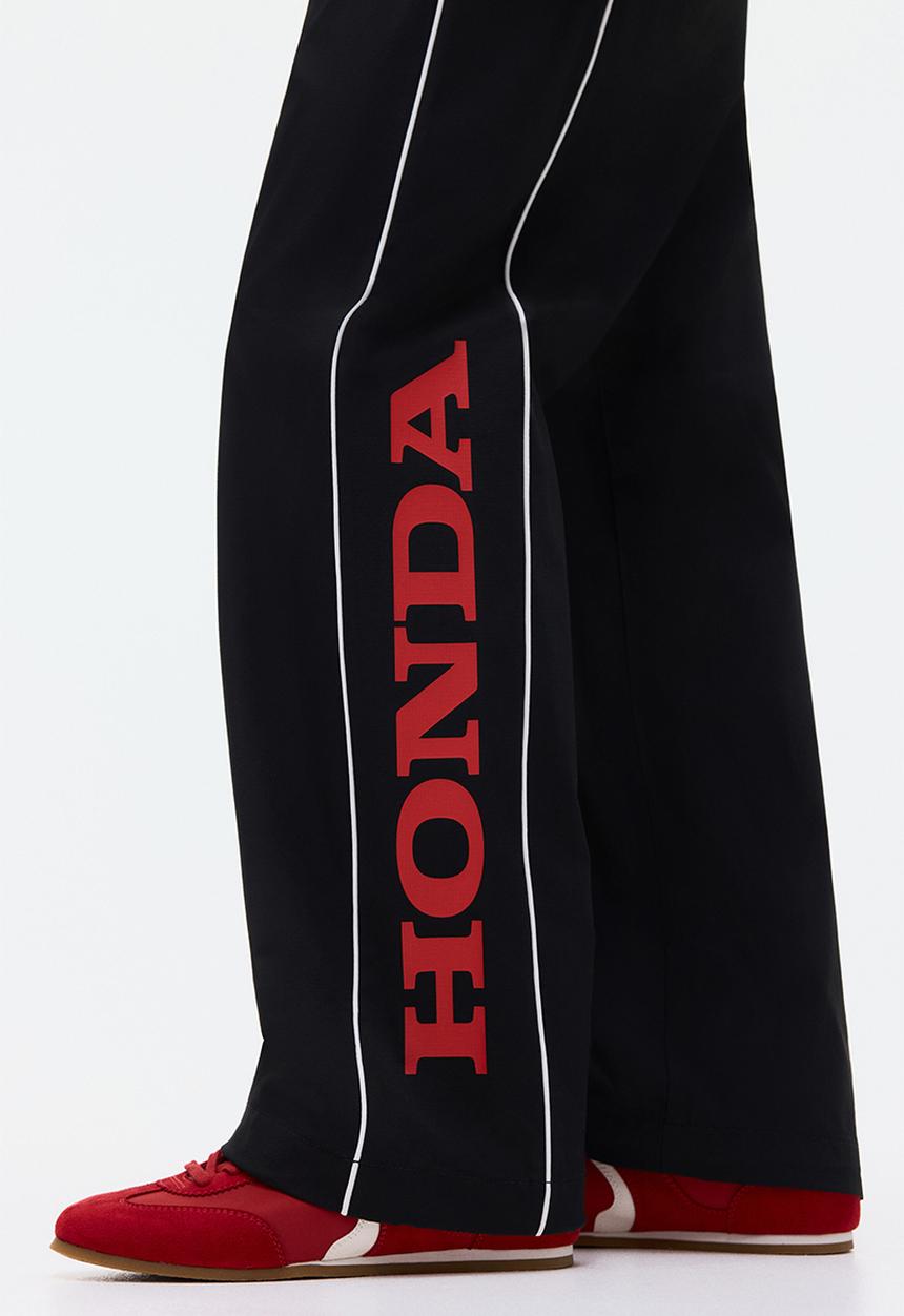 H&M - Relaxed fit printed track pants - black/honda