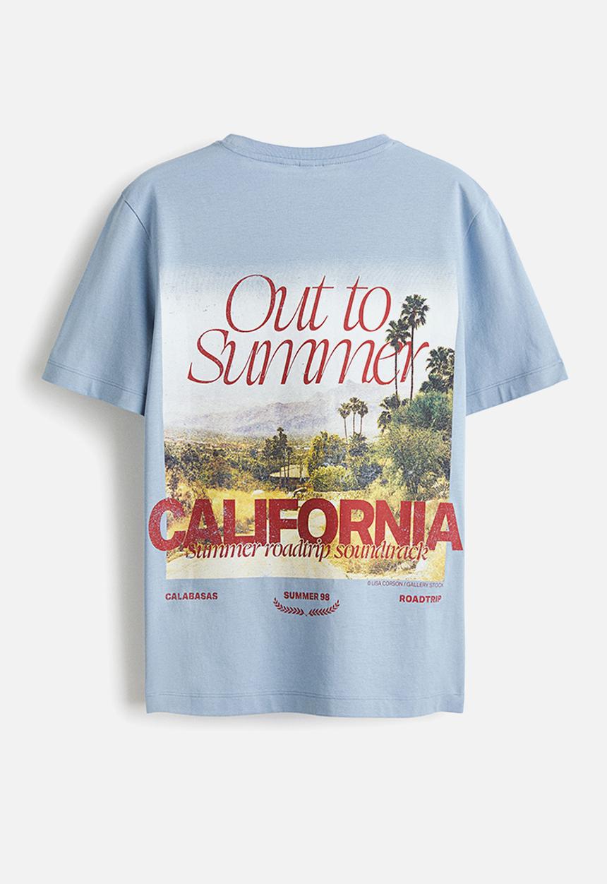 H&M - Printed t-shirt - dusty light blue/california
