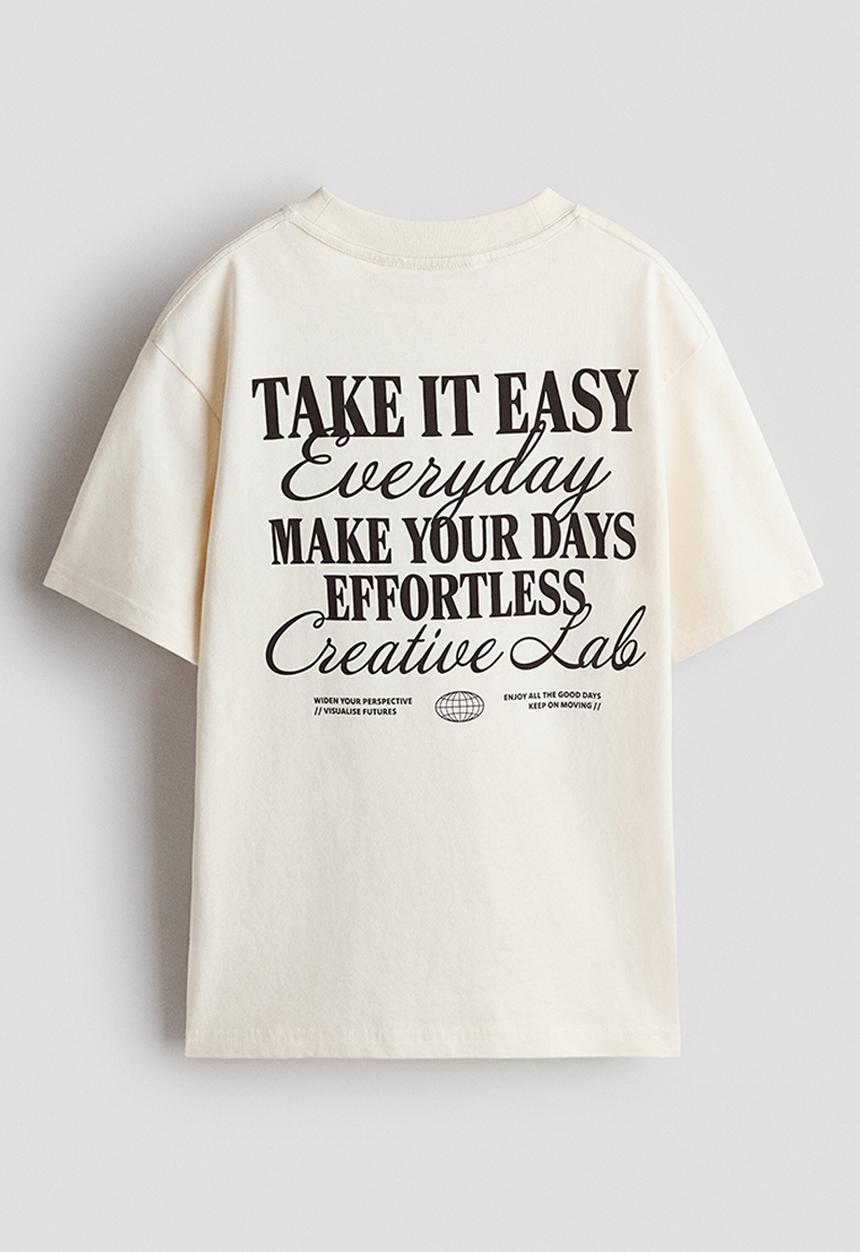 H&M - Loose-fit printed t-shirt - cream/effortless