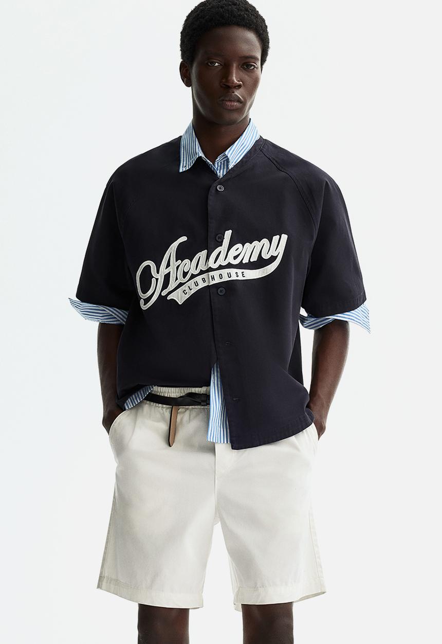 H&M - Relaxed fit cotton shorts - white