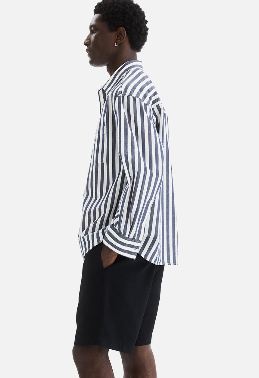 H&M - Relaxed fit linen-blend shorts - black