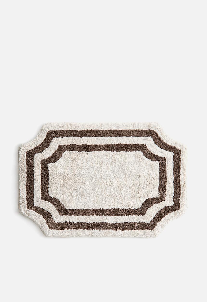 H&M - Tufted cotton bath mat - cream