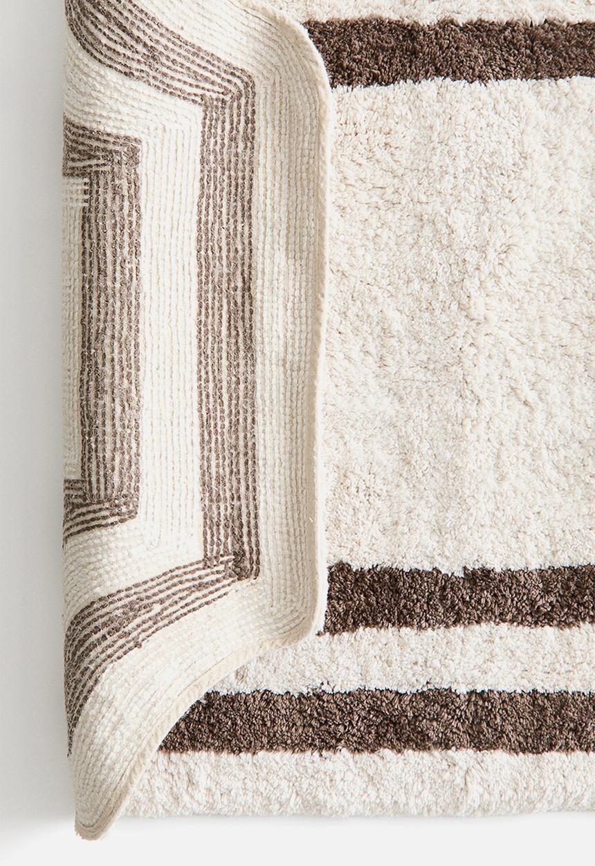 H&M - Tufted cotton bath mat - cream