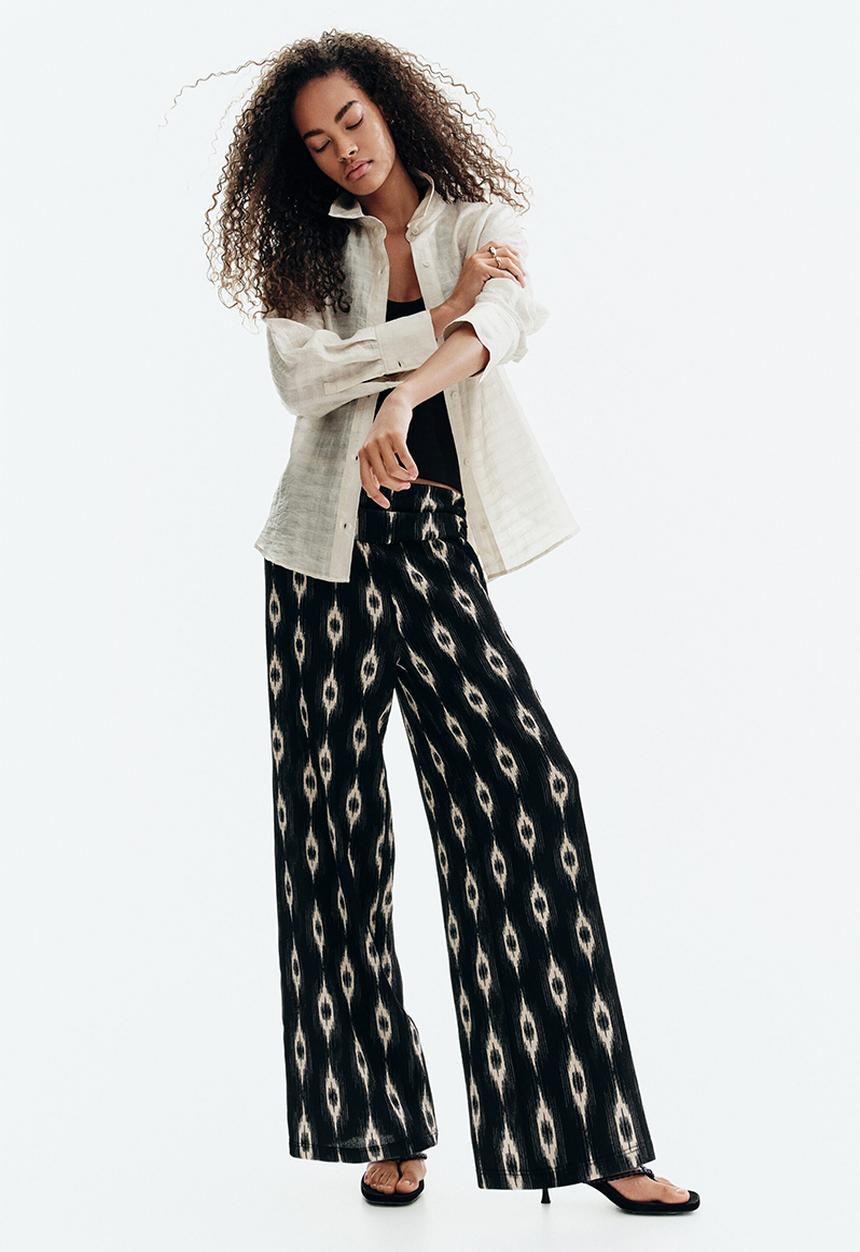 H&M - Wide gathered-waist trousers - black/patterned