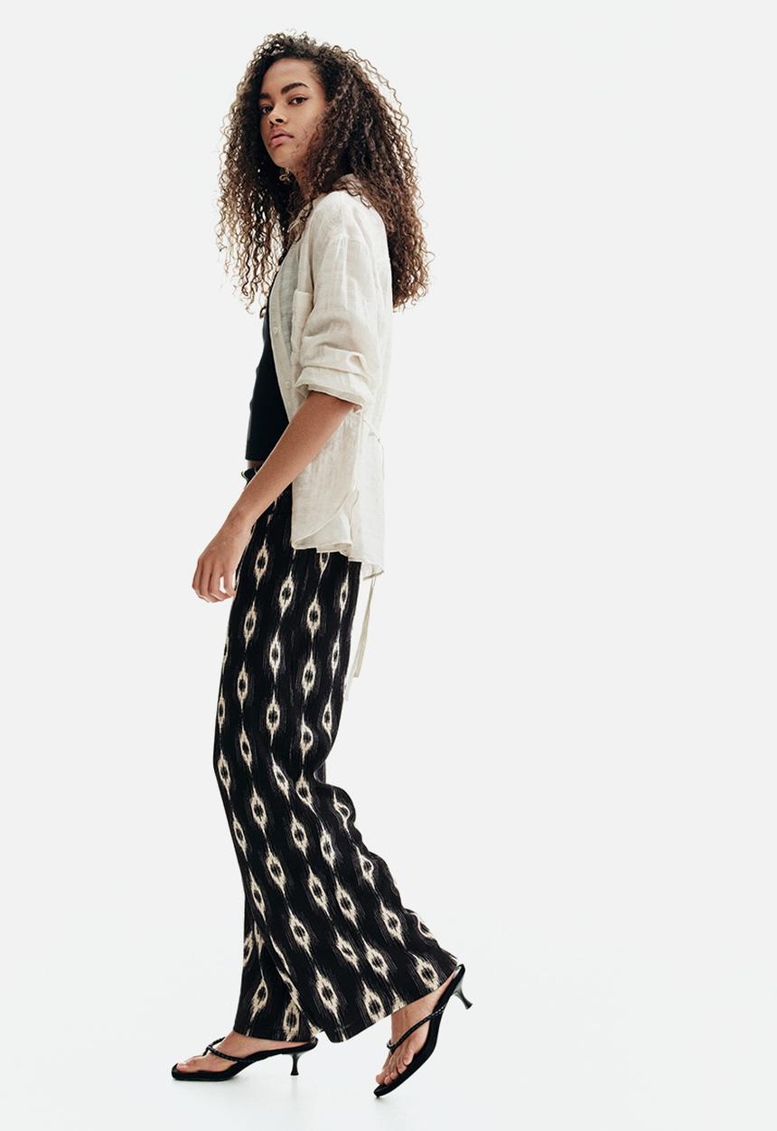 H&M - Wide gathered-waist trousers - black/patterned