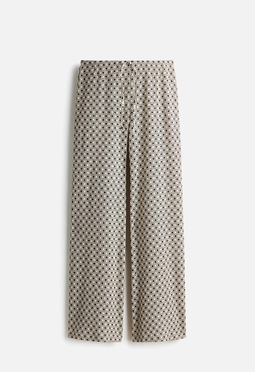 H&M - Textured jersey trousers - light beige/patterned