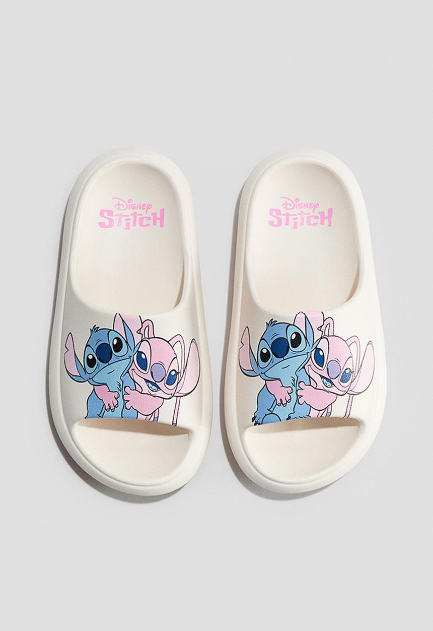 H&M - Moulded pool slides - cream/lilo & stitch