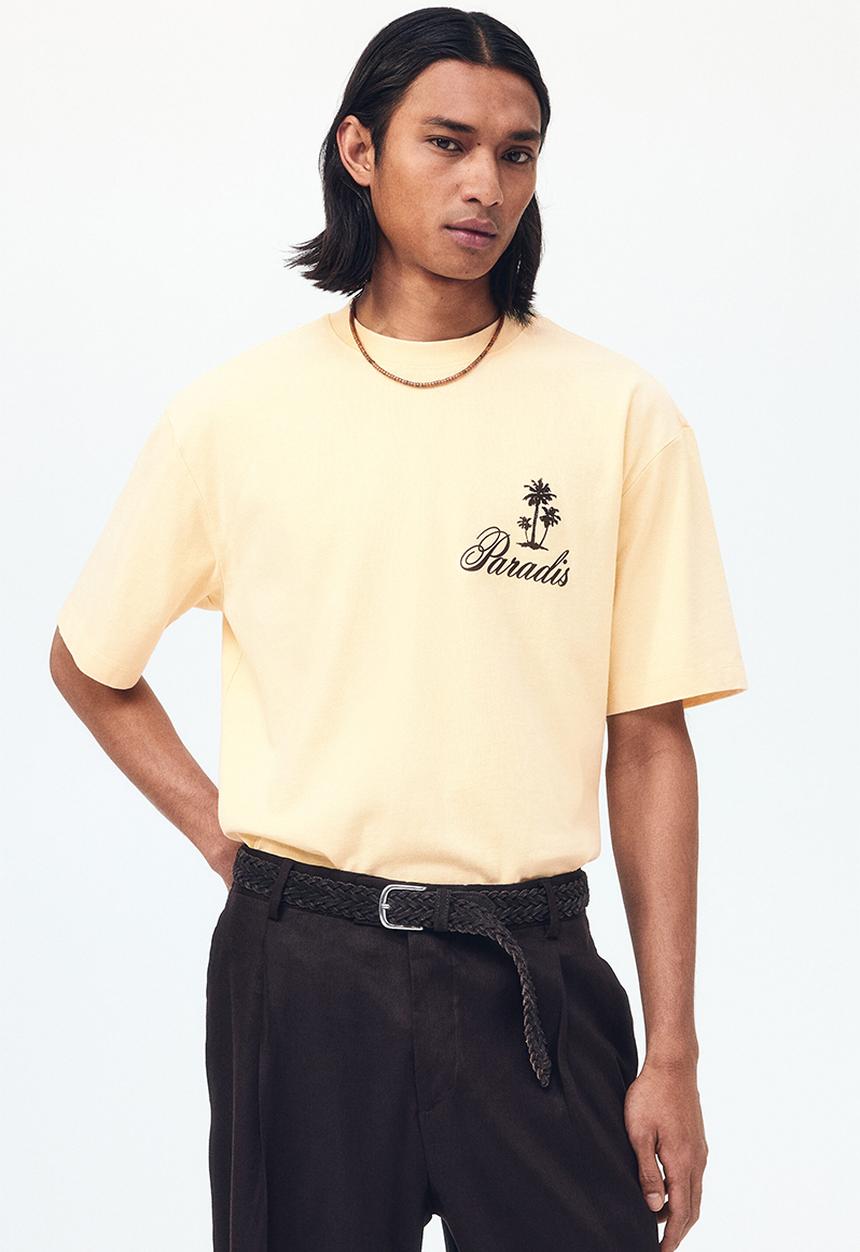 H&M - Relaxed fit printed cotton T-shirt - light yellow/paradis